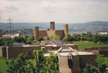 Father Kentenich House on Mount Schoenstatt, Germany, where the secretariat is located. Background: Adoration Church / Church of the Holy Trinity.